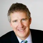 Dr. Michael Edmunds, a Carson City-based orthopedic surgeon is smiling for his headshot